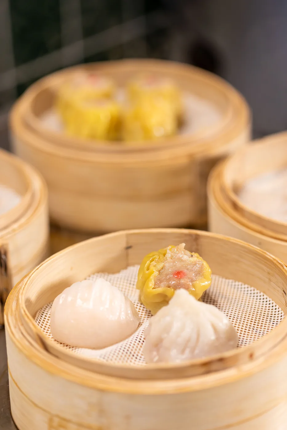 Bamboo steamers with har gow, siu mai and steamed dumplings at Dumpling Time Block Place