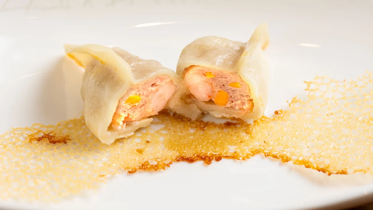 Chicken, prawn and corn dumpling cut open at Dumpling Time Block Place